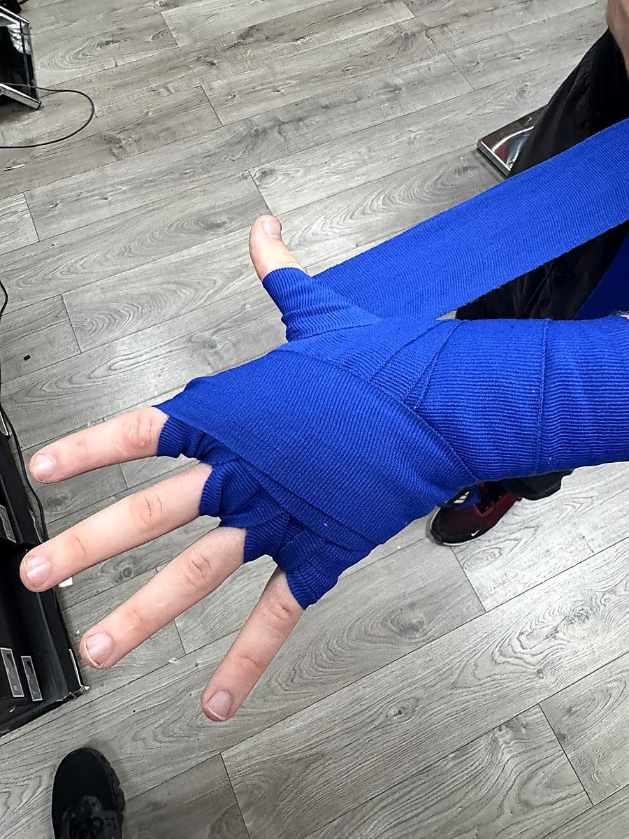 Step 5: Secure the thumb base with a loop of boxing hand wrap